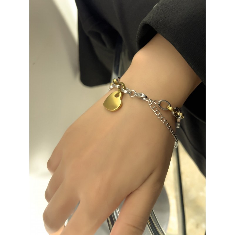 Titanium steel gold-plated two-color hollow peach heart chain